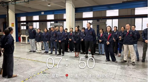 Morning safety briefing at EC Fastener factory